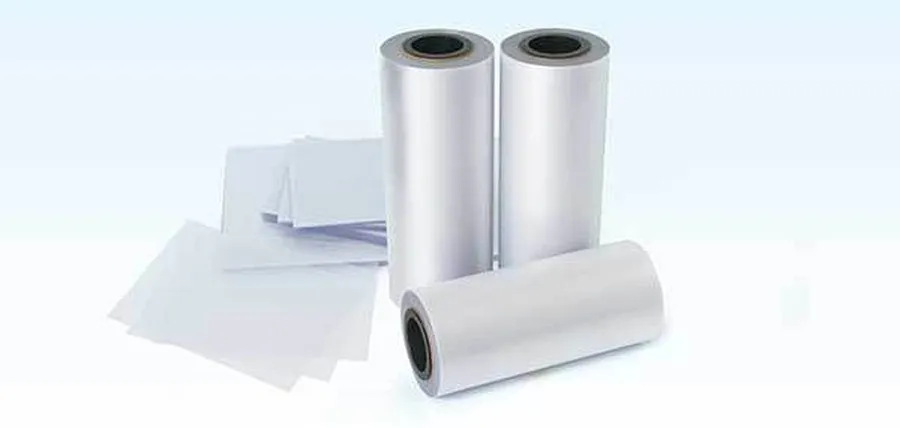 Clear overlay film rolls and sheets for card lamination