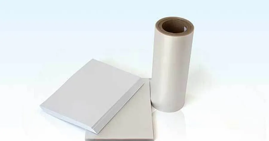 PETG core sheet and clear overlay film — the two building blocks of a laminated card body.